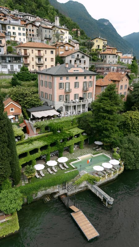 Aerial view of the villa and its lakeside pool